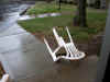 Wind-toppled chair out front