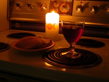 Bread and wine by candlelight