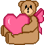 Large teddy bear holding a heart